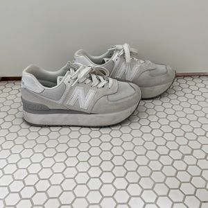 Women’s 574+ Reflection/Rain Cloud in White by New Balance.